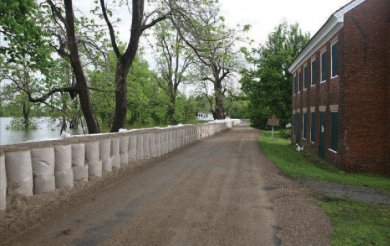 TYPAR Geocell flood wall protecting buildings from flood water