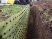 Biobarrier contains trifluralin to act as a barrier against root growth